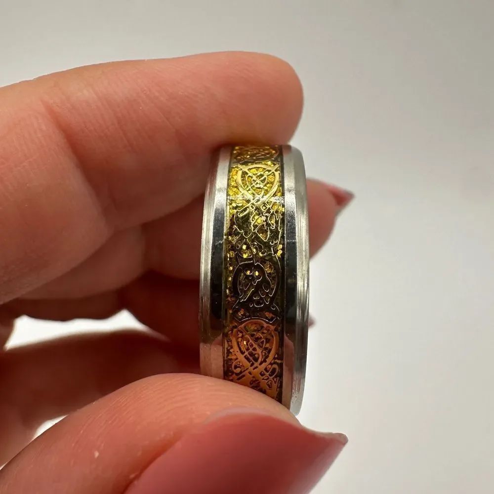 Men's size 13, Silver tone‎ metal with silver/gold scroll work in center, ring!